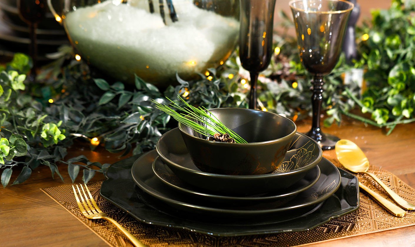 A stylish outdoor lounge area with comfortable seating and decorative pillows.